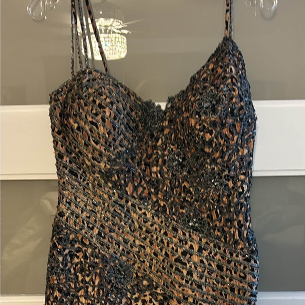 Cocktail dress. Leopard print with beading.
